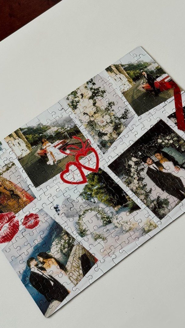 Custom wedding photo jigsaw puzzle with red heart and lip accents on white background