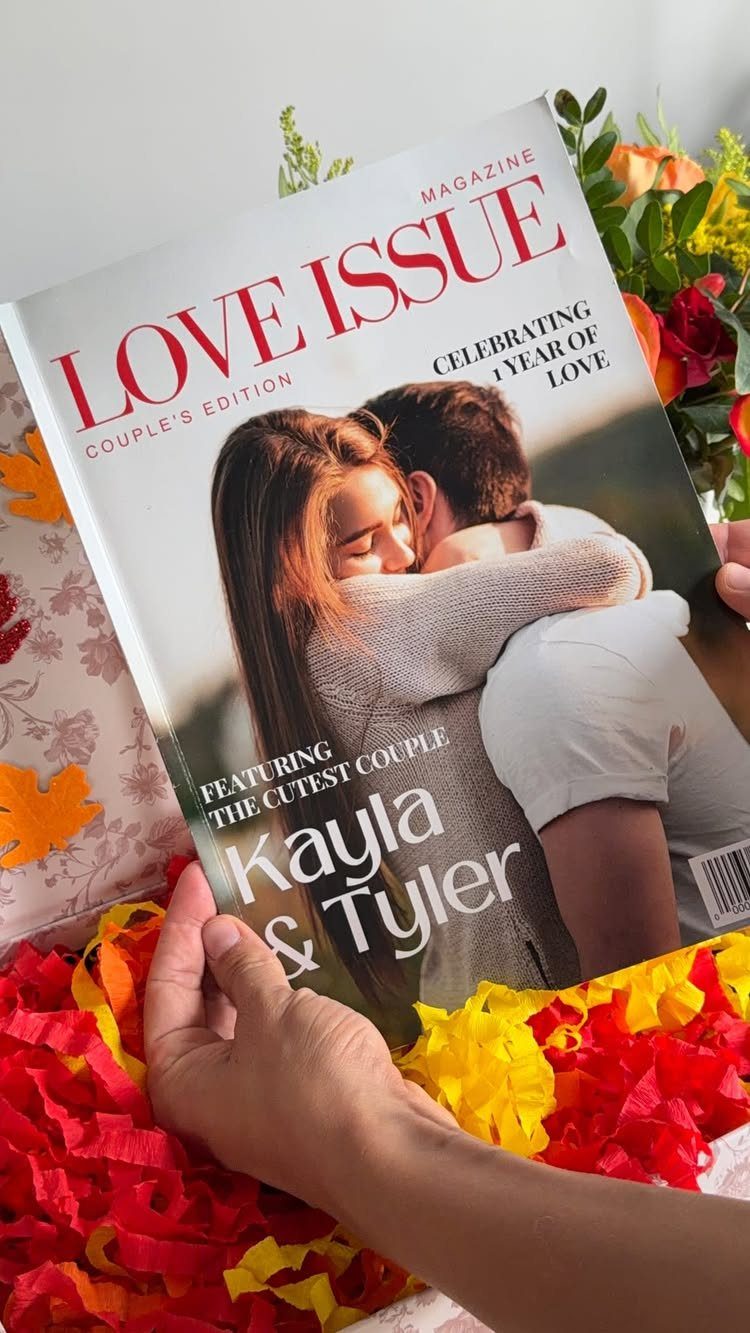 Custom love magazine cover featuring a hugging couple held over colorful shredded paper.