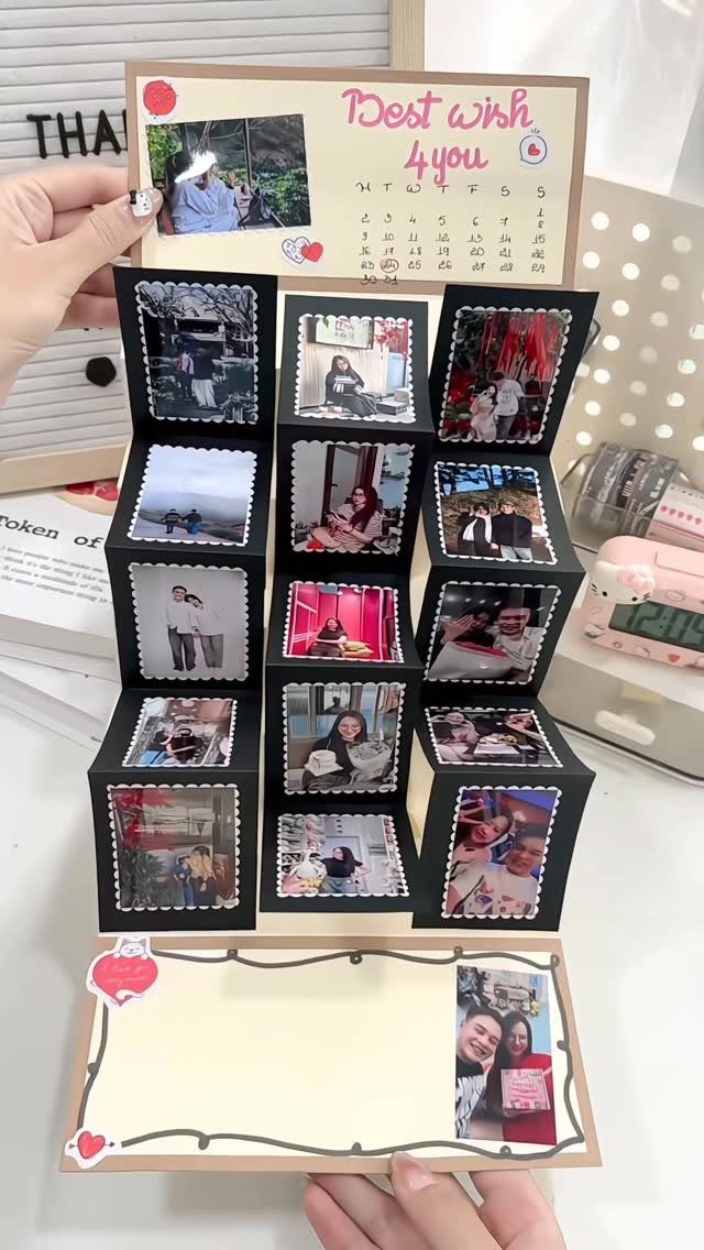 Pop-up greeting card with a 3D grid of couple photos and handwritten wishes.