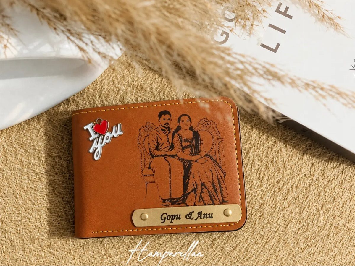 Brown leather wallet with engraved couple illustration and personalized name plate.
