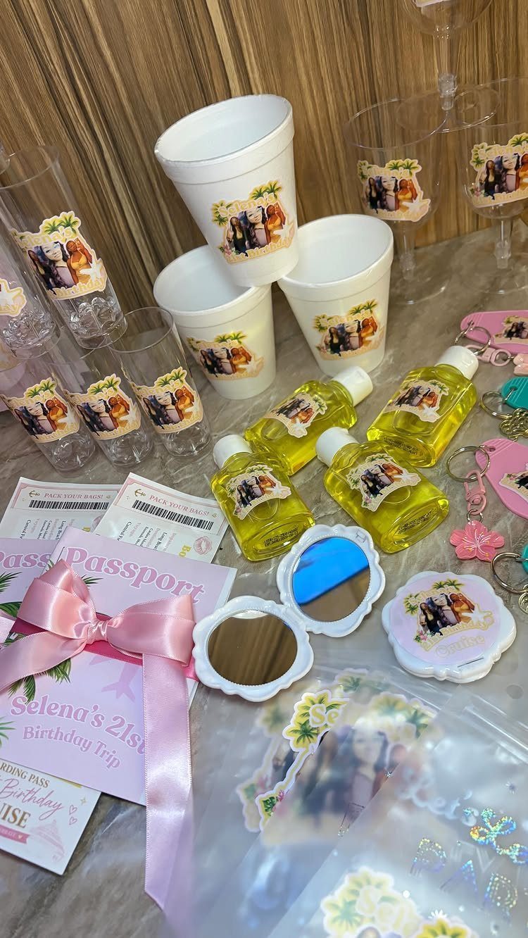 Personalized party favors with couple photos, including cups, bottles, and a pink passport.