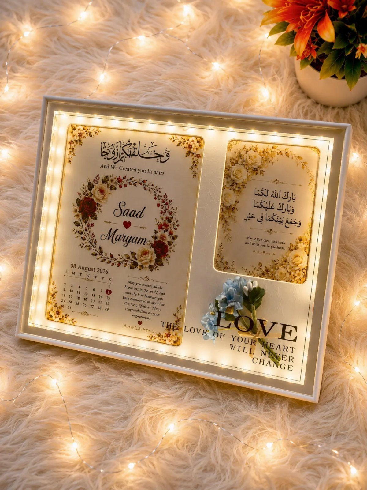 Personalized wedding frame with names and calendar, illuminated by warm LED lights.