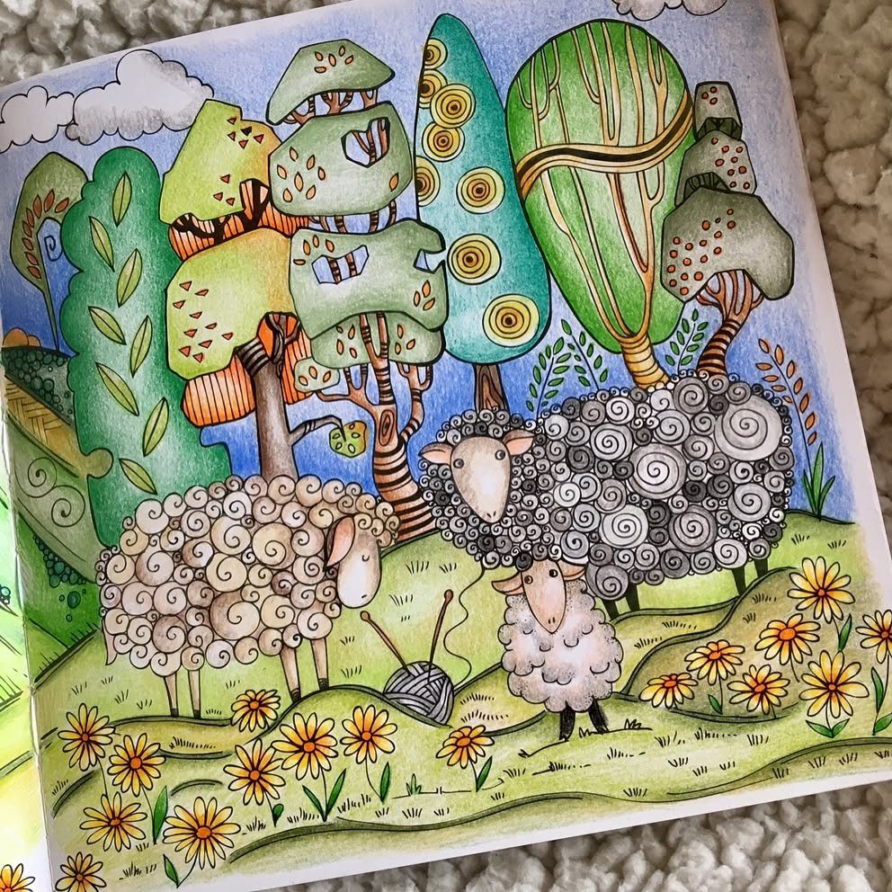 Colored coloring book page showing whimsical sheep and trees in a flowery meadow.