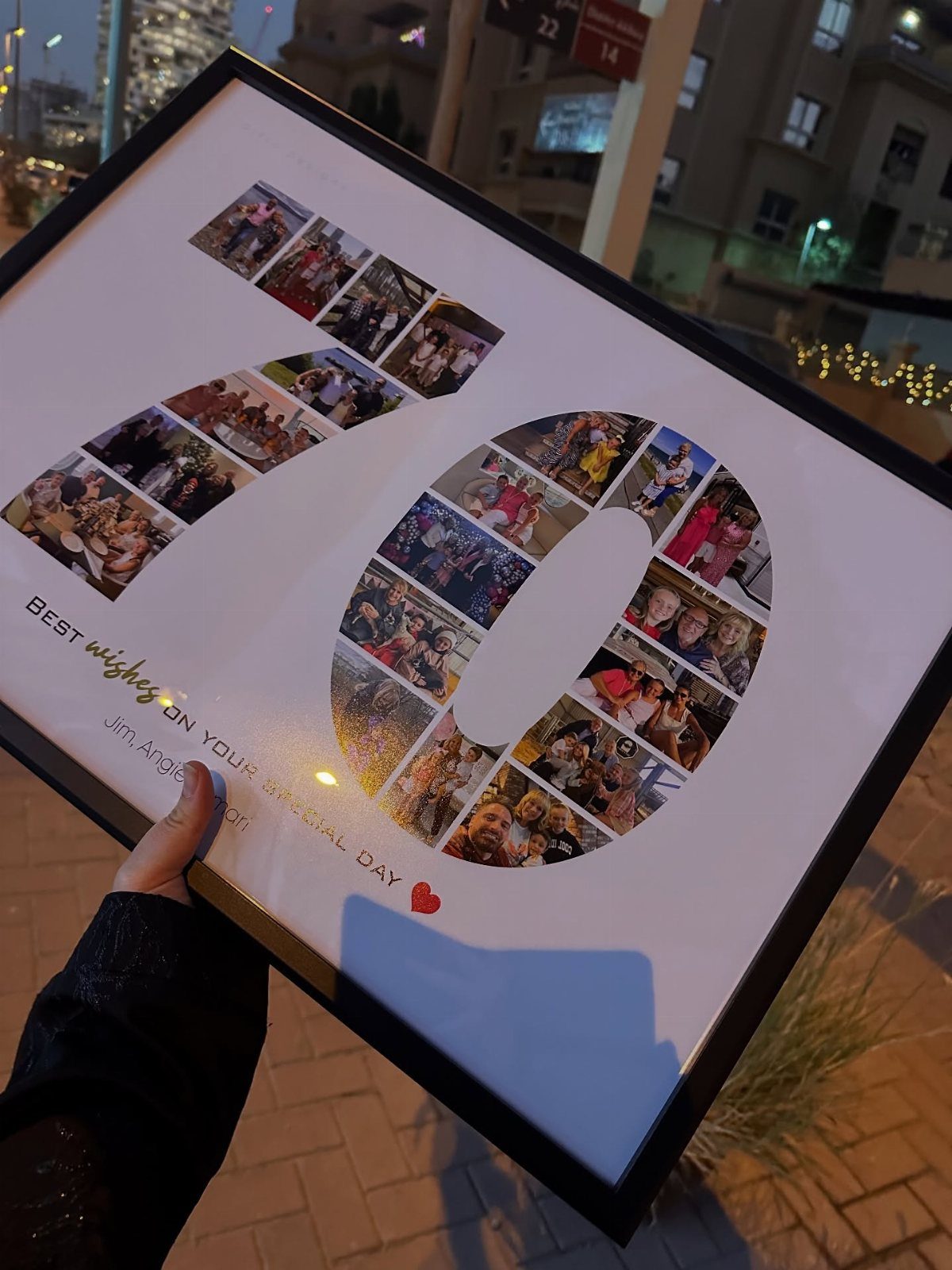 Framed photo collage forming the number 70 for a birthday gift.