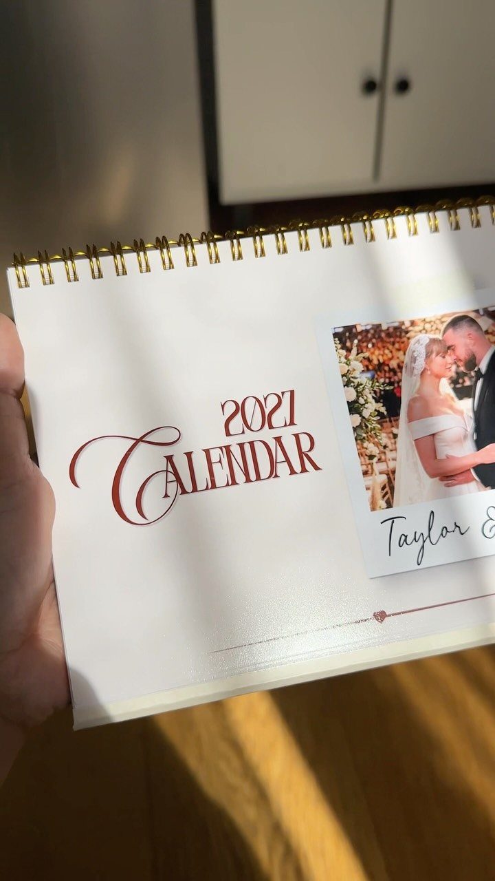 Spiral-bound 2021 calendar cover featuring a wedding photo of a couple.