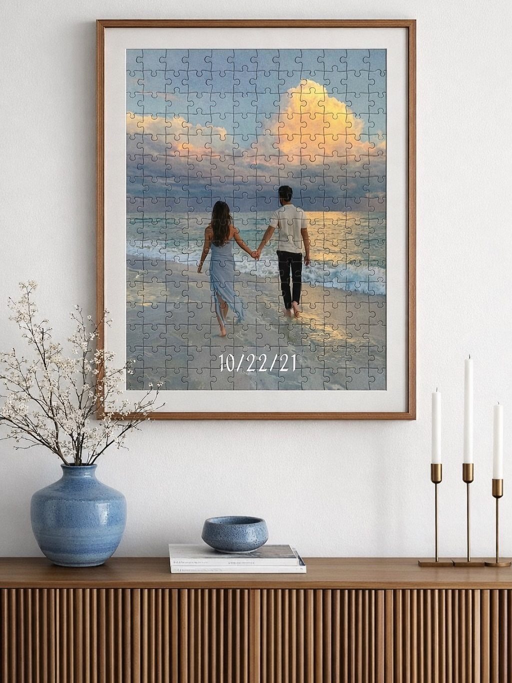 Framed custom jigsaw puzzle of a couple on a beach with a date.