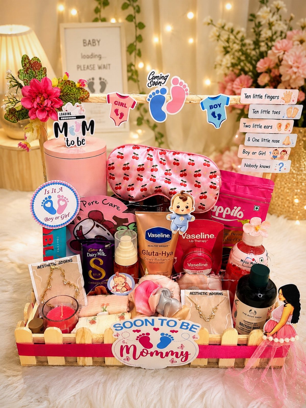 Baby shower gift basket with skincare, sleep mask, and Mommy to be signs.