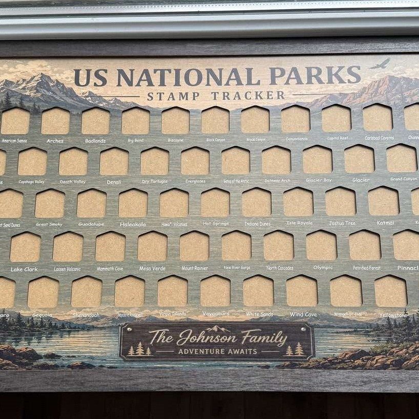 Wooden US National Parks stamp tracker board with mountain scenery and family name.