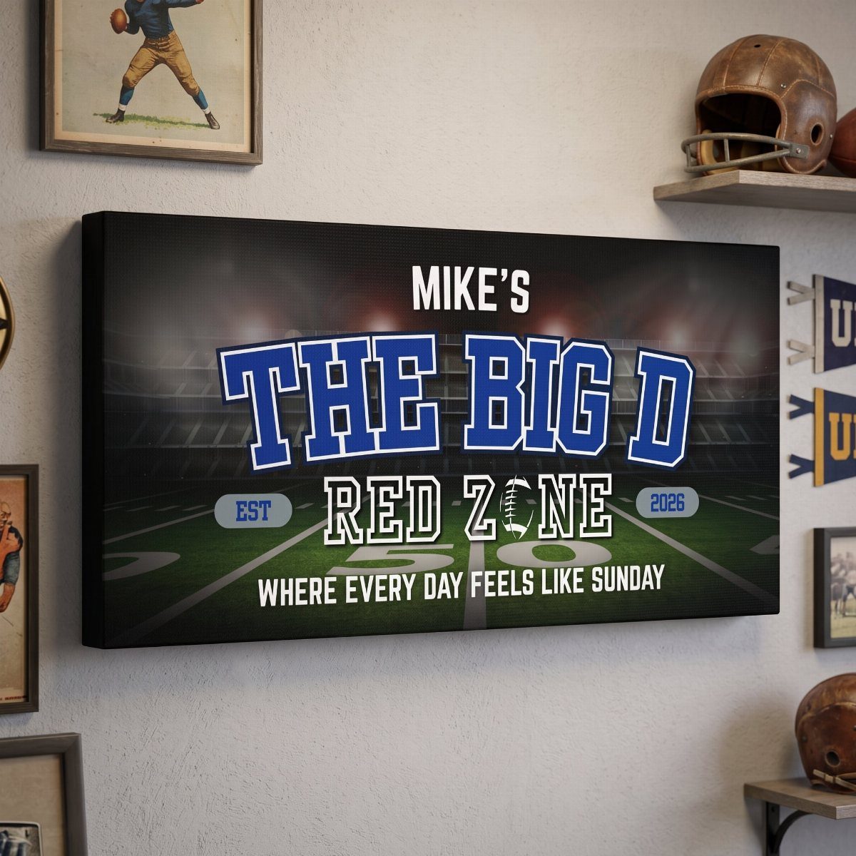 Personalized football themed man cave sign hanging on a wall with sports memorabilia