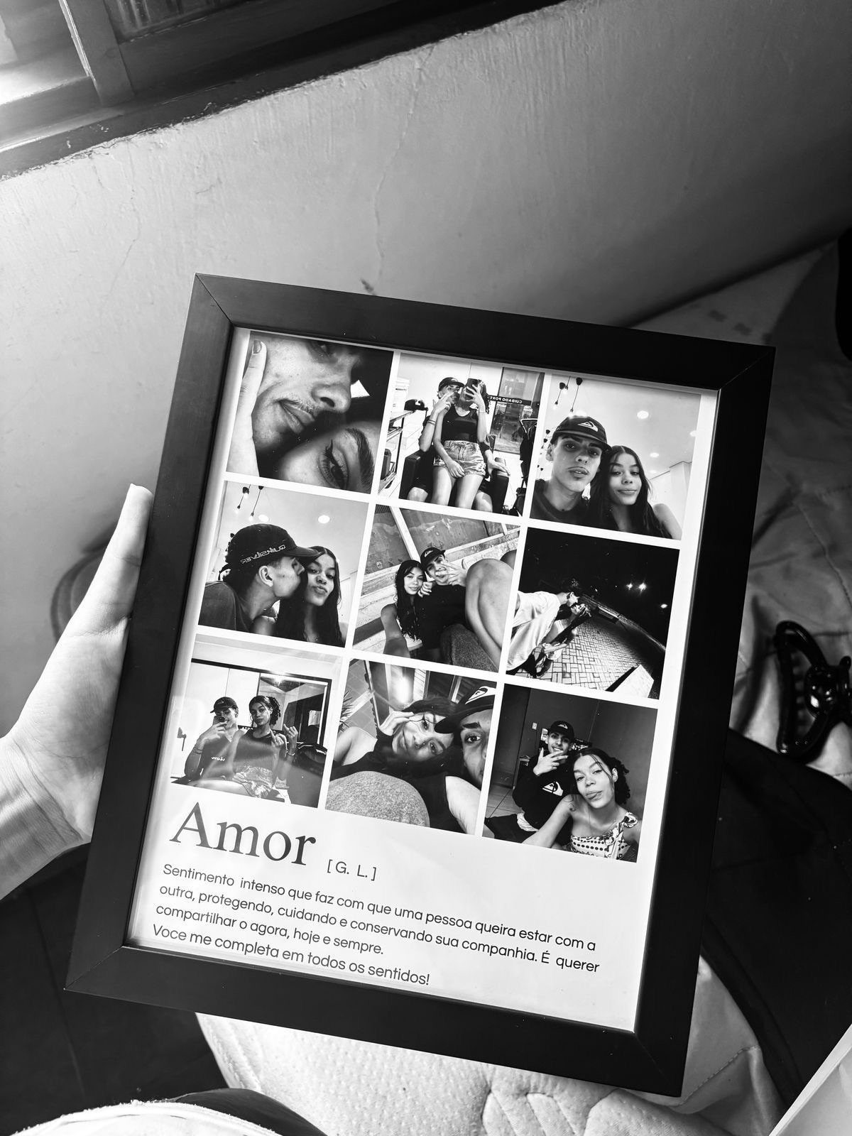Black framed photo collage of a couple with a romantic text description below.