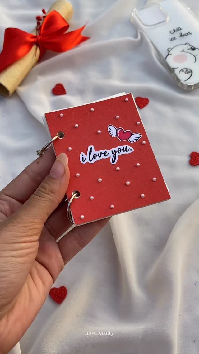 Small red handmade memory book with pearls and i love you sticker