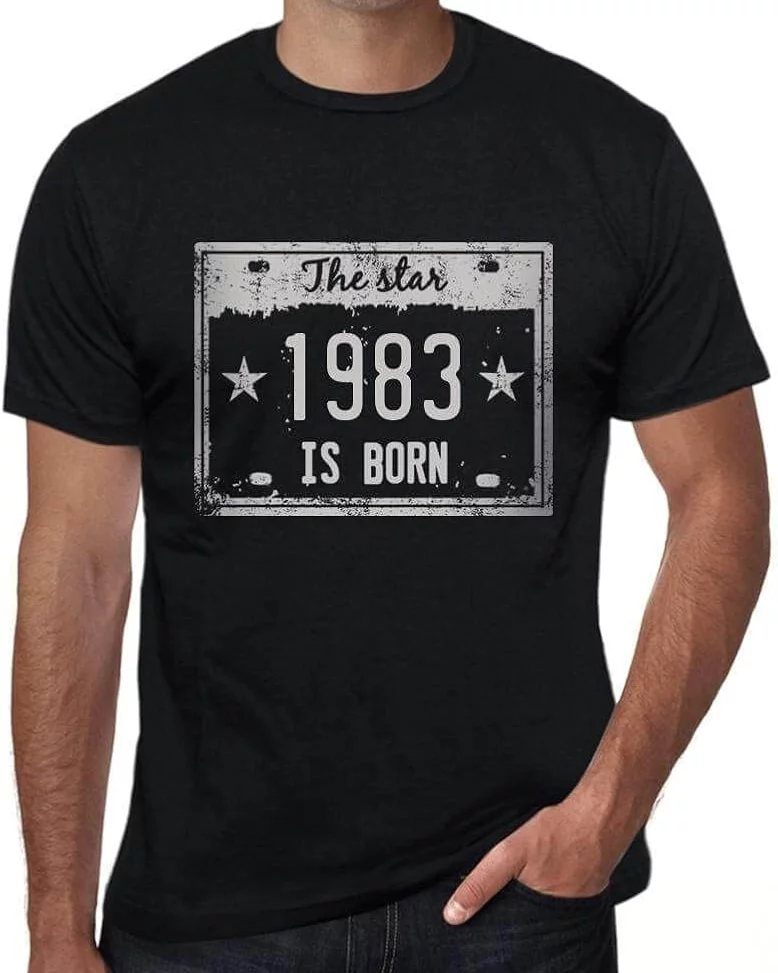 Man wearing a black t-shirt with a 1983 birth year license plate design.
