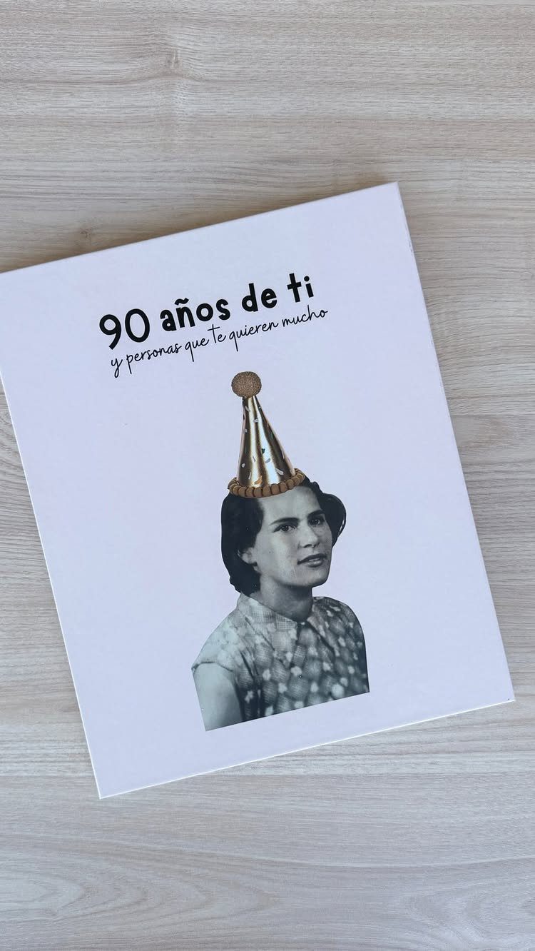 White memory book cover with a woman's photo and 90th birthday text.