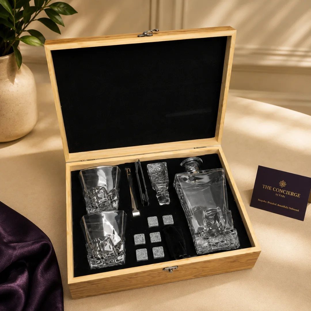 Whiskey decanter set with glasses and chilling stones in a wooden gift box.