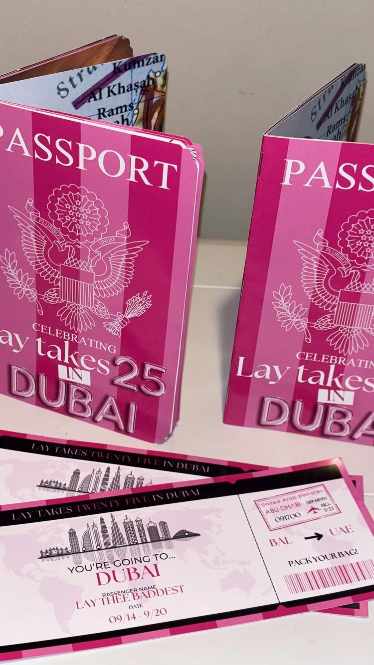 Pink custom passport booklets and boarding passes for a 25th birthday trip to Dubai.
