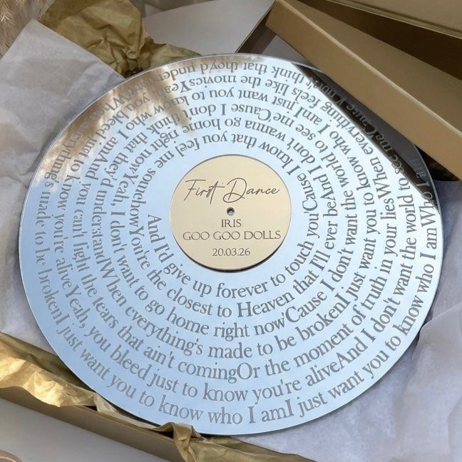 Gold-plated vinyl record with engraved lyrics and first dance details in a gift box