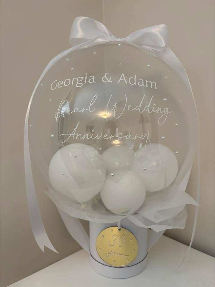 Pearl wedding anniversary balloon gift with white balloons and a gold 30 years medallion