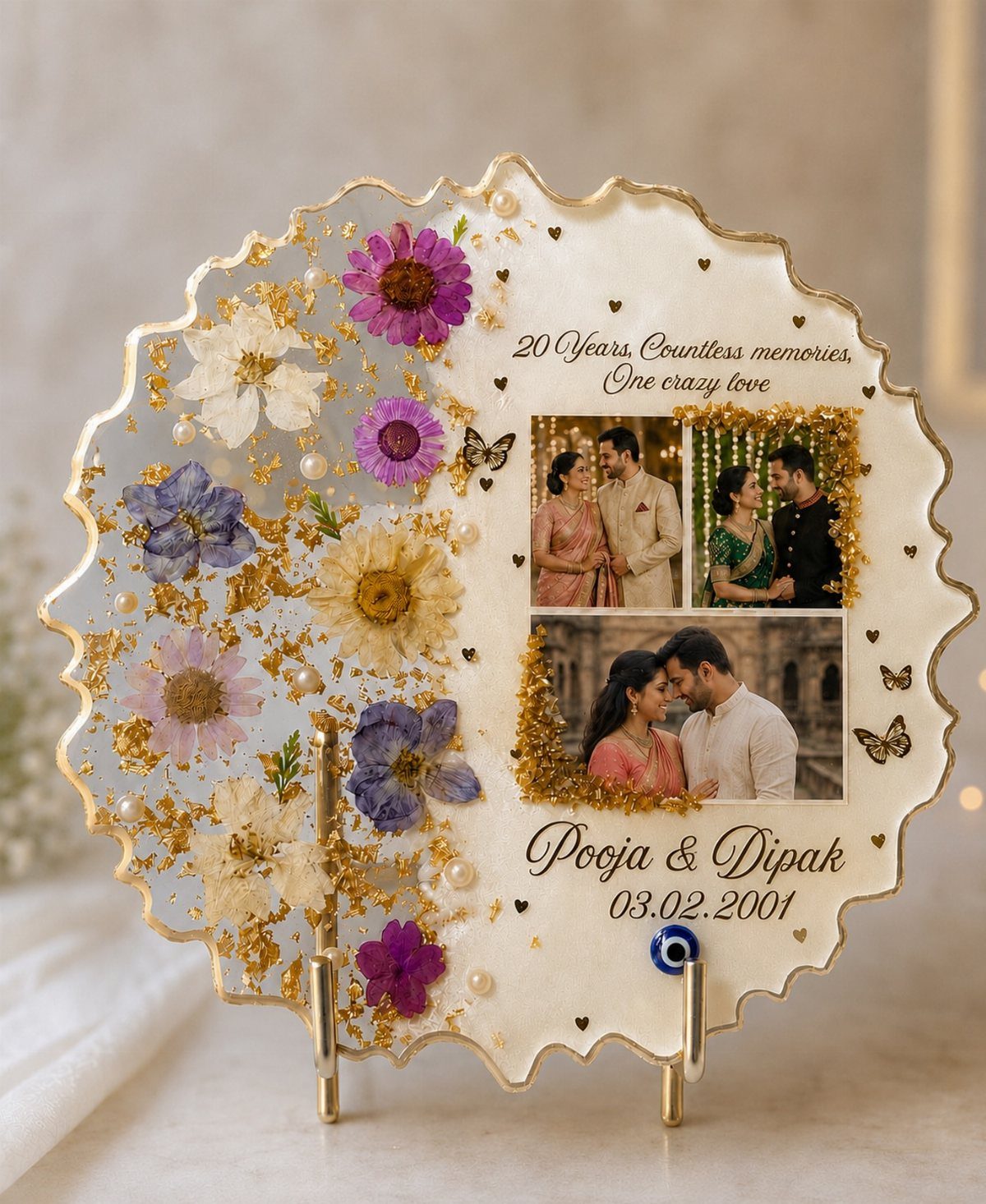 Resin plaque with pressed flowers, gold foil, and couple photos for anniversary gift